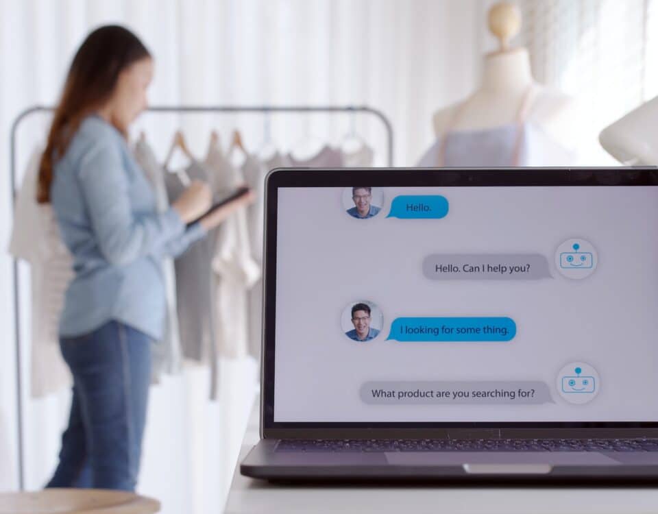 Chatbot conversation on laptop screen app interface with artificial intelligence technology