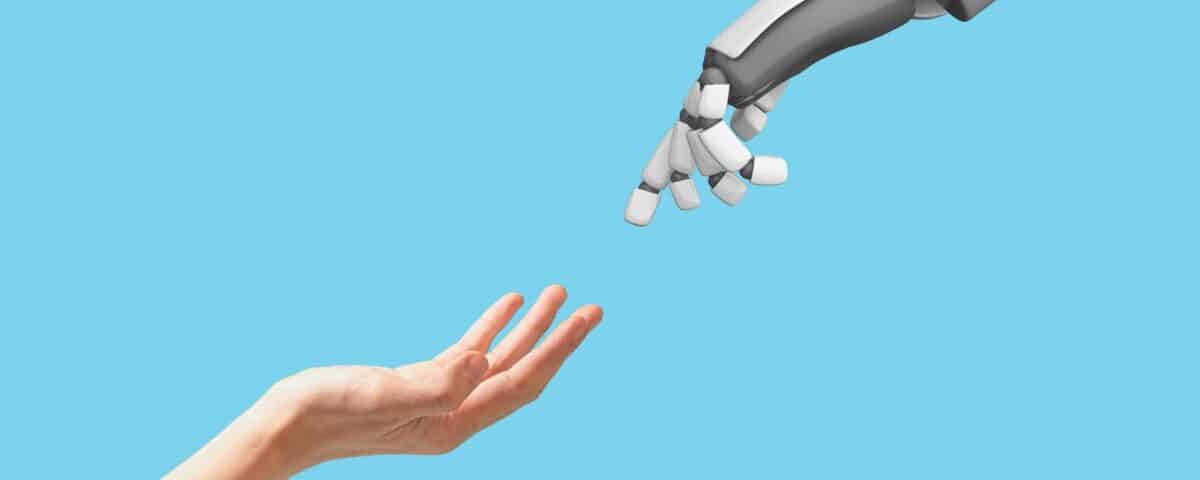 Human hand and robot hand with empty space on blue background