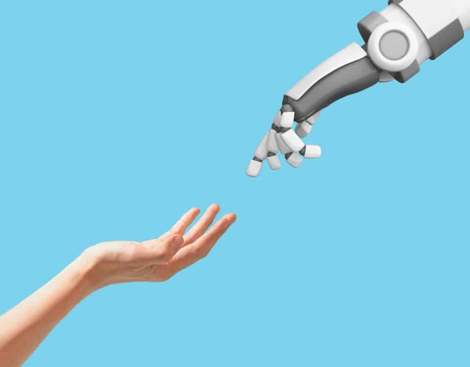 Human hand and robot hand with empty space on blue background